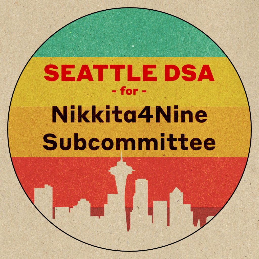 Alt Text: Text in red and black "Seattle DSA -for- Nikkita4Nine. Subcommittee" on a circular rainbow gradient on a craft paper background